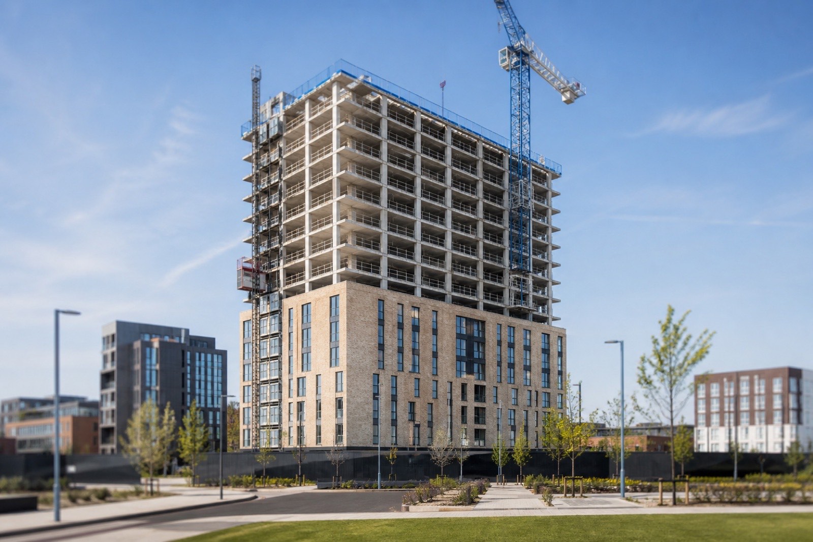 A student accommodation tower under construction with a tower crane